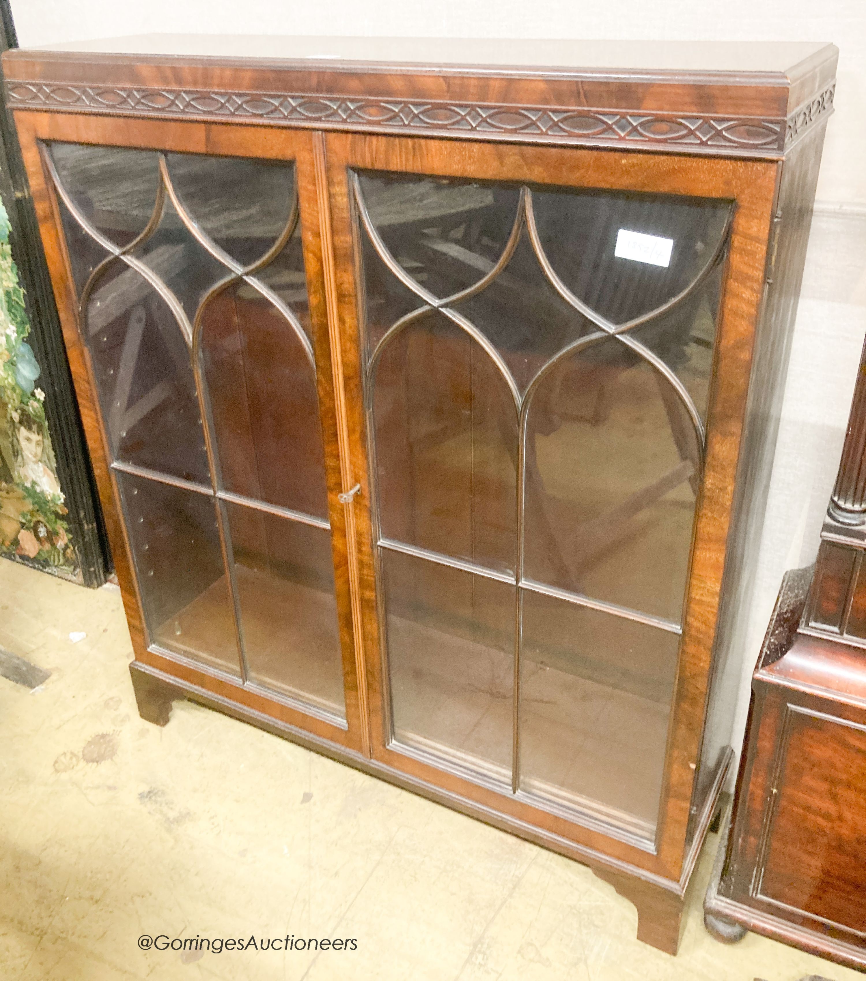 A 1920's Georgian style mahogany bookcase, width 91cm, depth 26cm, height 108cm